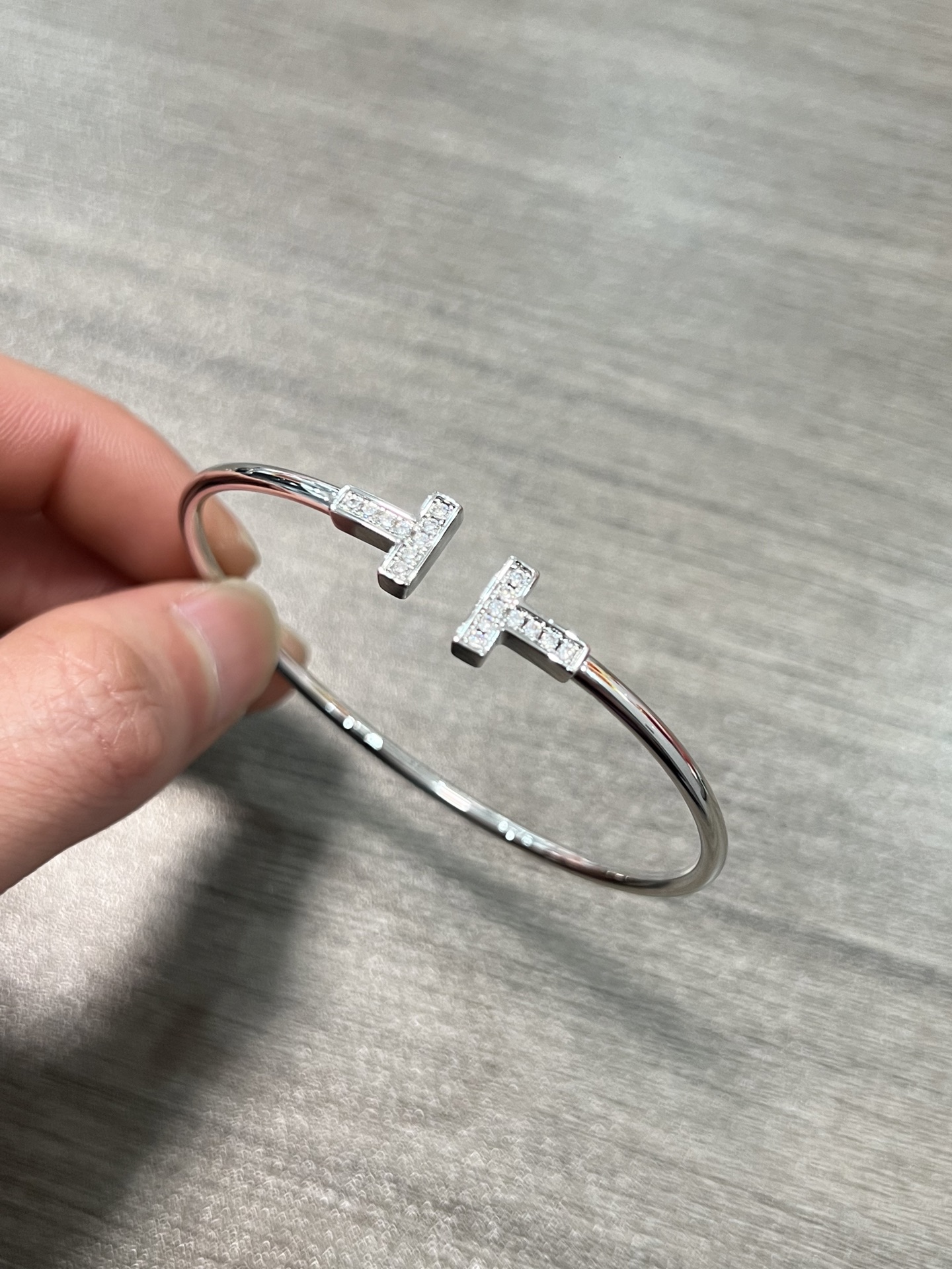 Tiffany Tiffany T bracelet 18k rose gold with clear diamond pave accents 17cm inner circumference