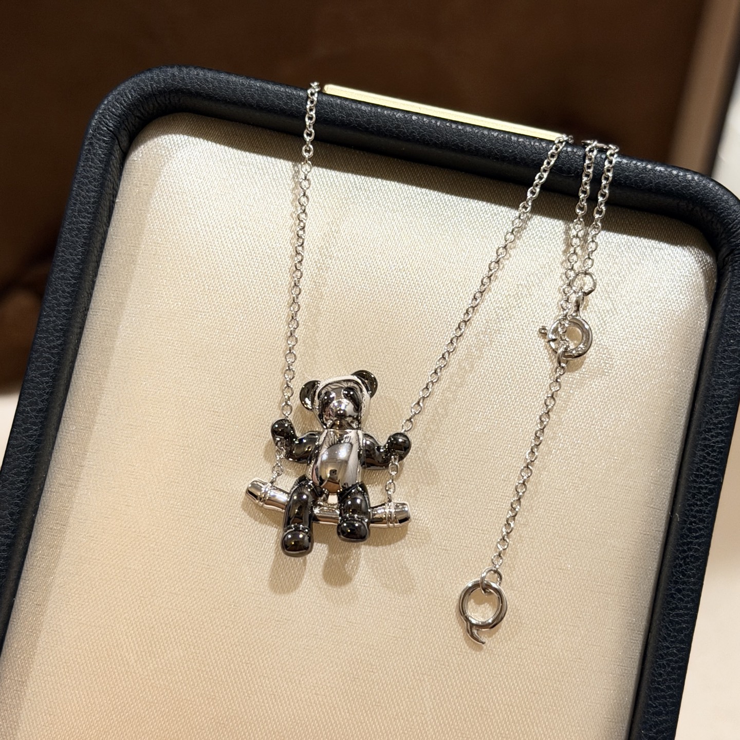 Qeelin Kirin High Jewelry Charity Panda Swing necklace 925 sterling silver with black rhodium plated panda detailing black and white glossy finish 42cm