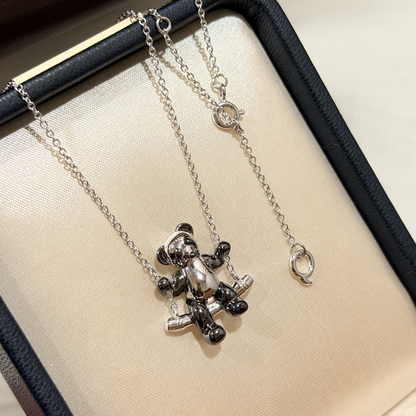 Qeelin Kirin High Jewelry Charity Panda Swing necklace 925 sterling silver with black rhodium plated panda detailing black and white glossy finish 42cm
