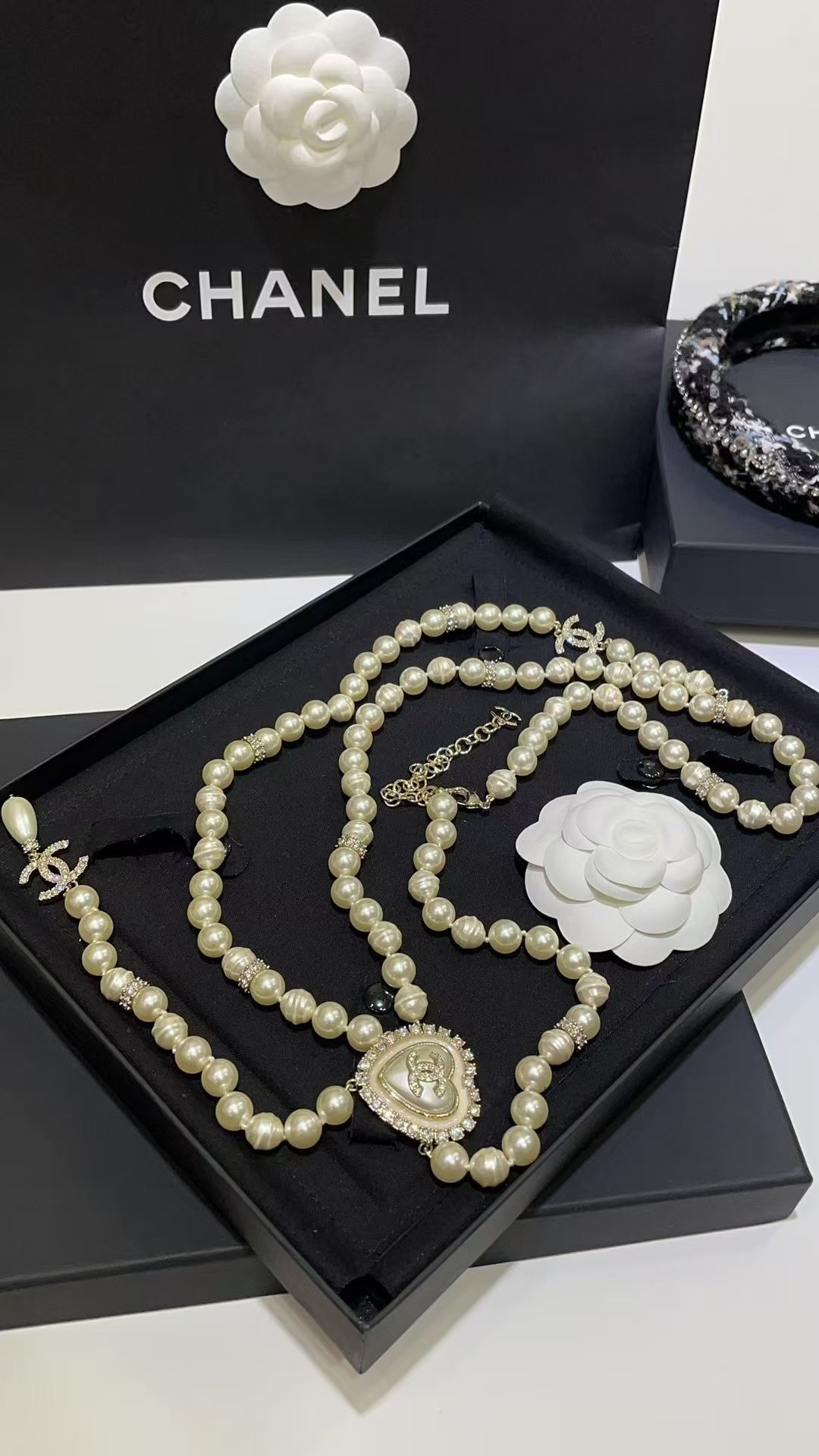 Chanel CC Heart Pearl Long Chain necklace light gold tone metal cream faux pearls clear crystal accents 80cm with 5cm extender