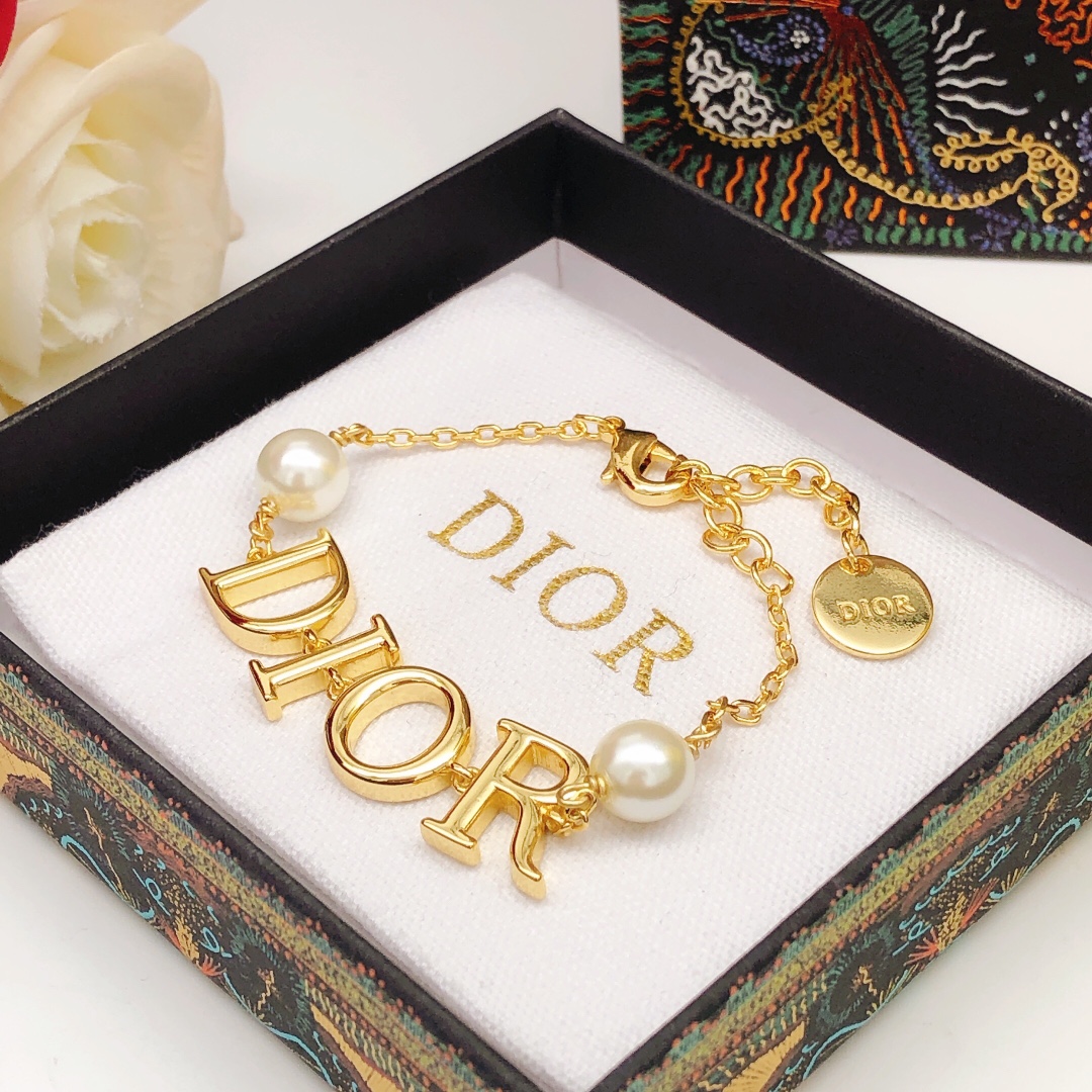Dior DXL0173 DIOR Logo Pearl Bracelet bracelet Gold-tone metal with white faux pearls 16cm with 3cm extender