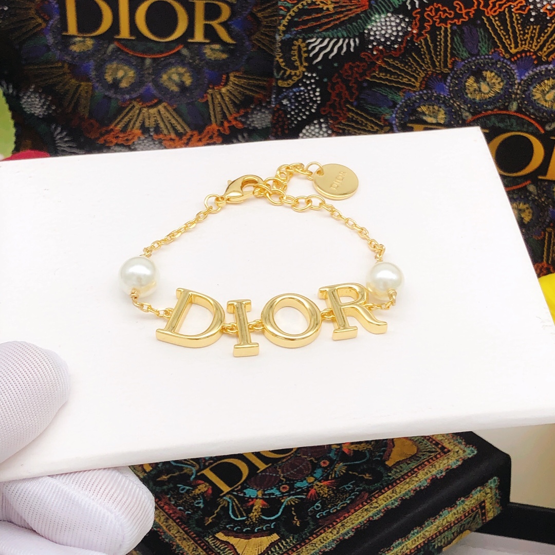 Dior DXL0173 DIOR Logo Pearl Bracelet bracelet Gold-tone metal with white faux pearls 16cm with 3cm extender