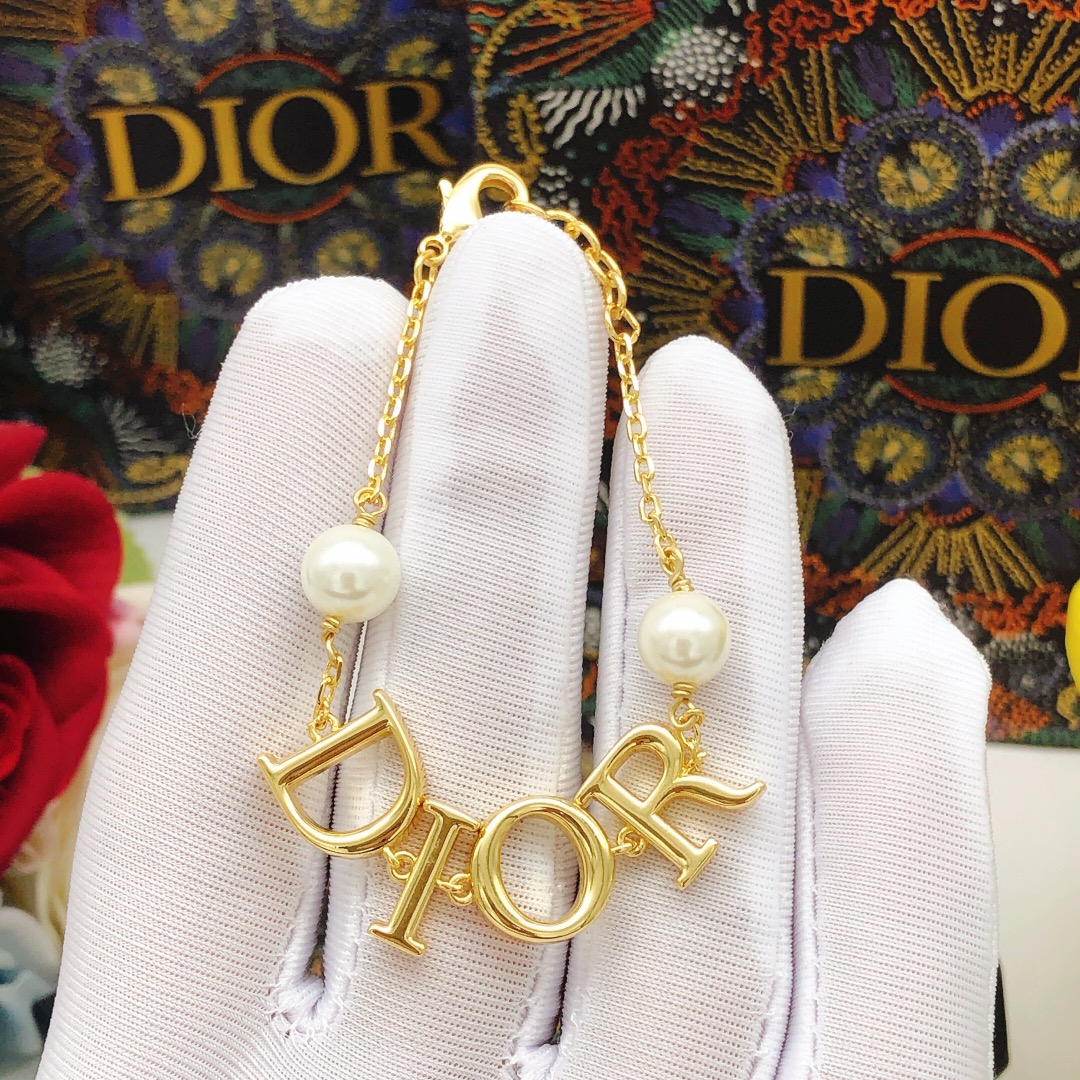Dior DXL0173 DIOR Logo Pearl Bracelet bracelet Gold-tone metal with white faux pearls 16cm with 3cm extender