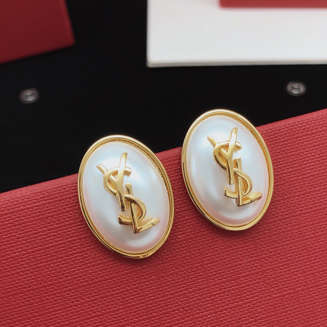 Saint Laurent Cassandre Oval Pearl Logo Earrings earrings gold-tone metal with white faux pearl 2 5cm length