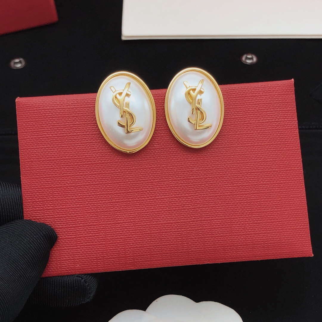 Saint Laurent Cassandre Oval Pearl Logo Earrings earrings gold-tone metal with white faux pearl 2 5cm length