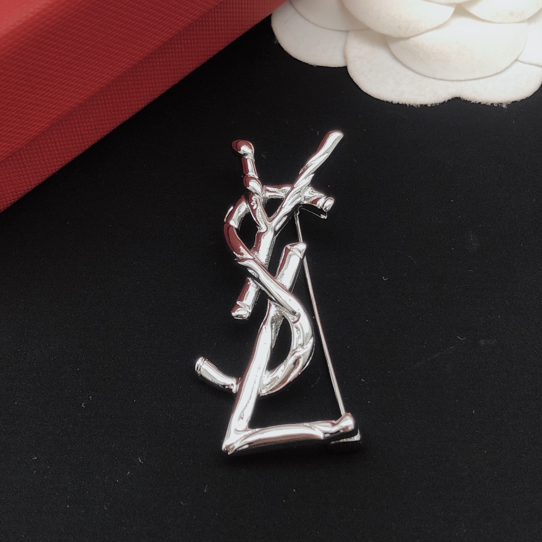 Saint Laurent Cassandre Twisted Monogram Brooch brooch silver-toned metal no accent stones 4 5cm height