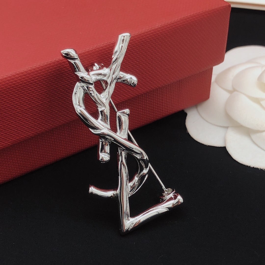Saint Laurent Cassandre Twisted Monogram Brooch brooch silver-toned metal no accent stones 4 5cm height