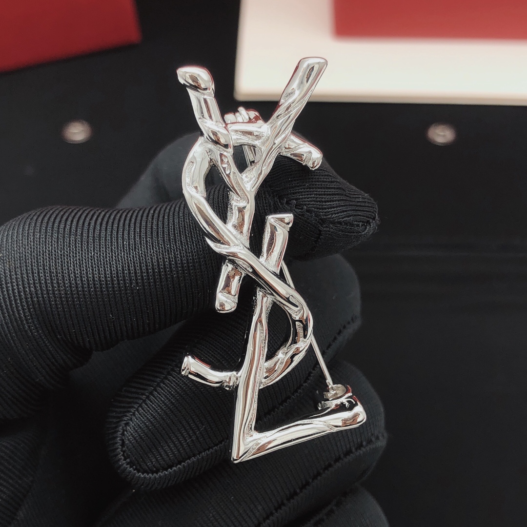 Saint Laurent Cassandre Twisted Monogram Brooch brooch silver-toned metal no accent stones 4 5cm height