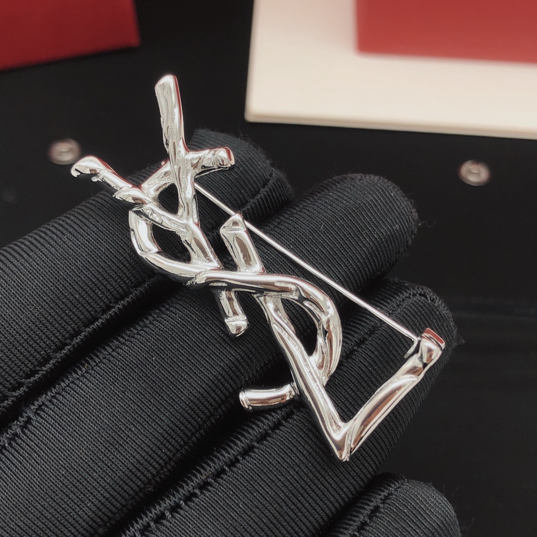 Saint Laurent Cassandre Twisted Monogram Brooch brooch silver-toned metal no accent stones 4 5cm height