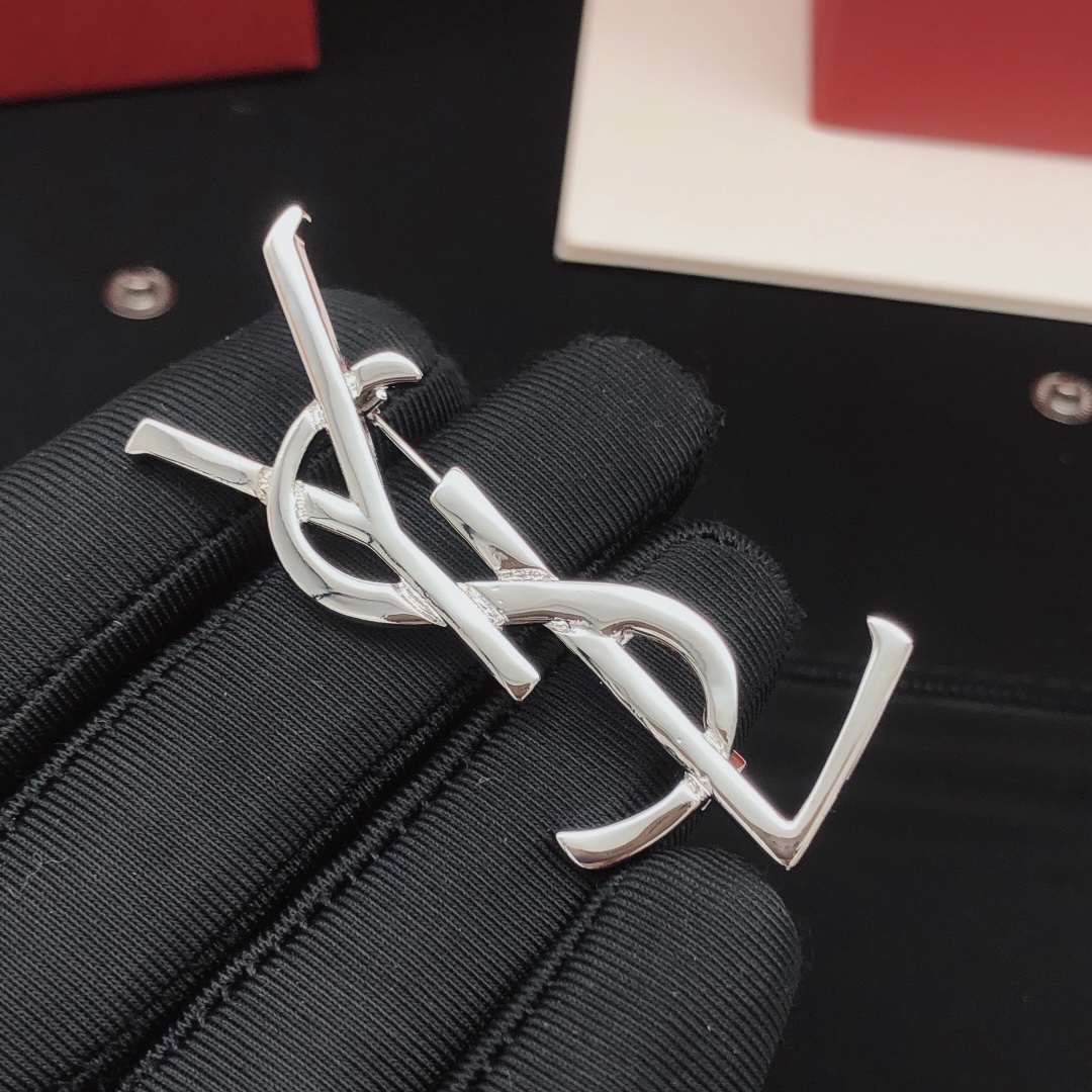 Saint Laurent Cassandre Monogram Brooch brooch silver-toned metal no gemstones 4 5cm length