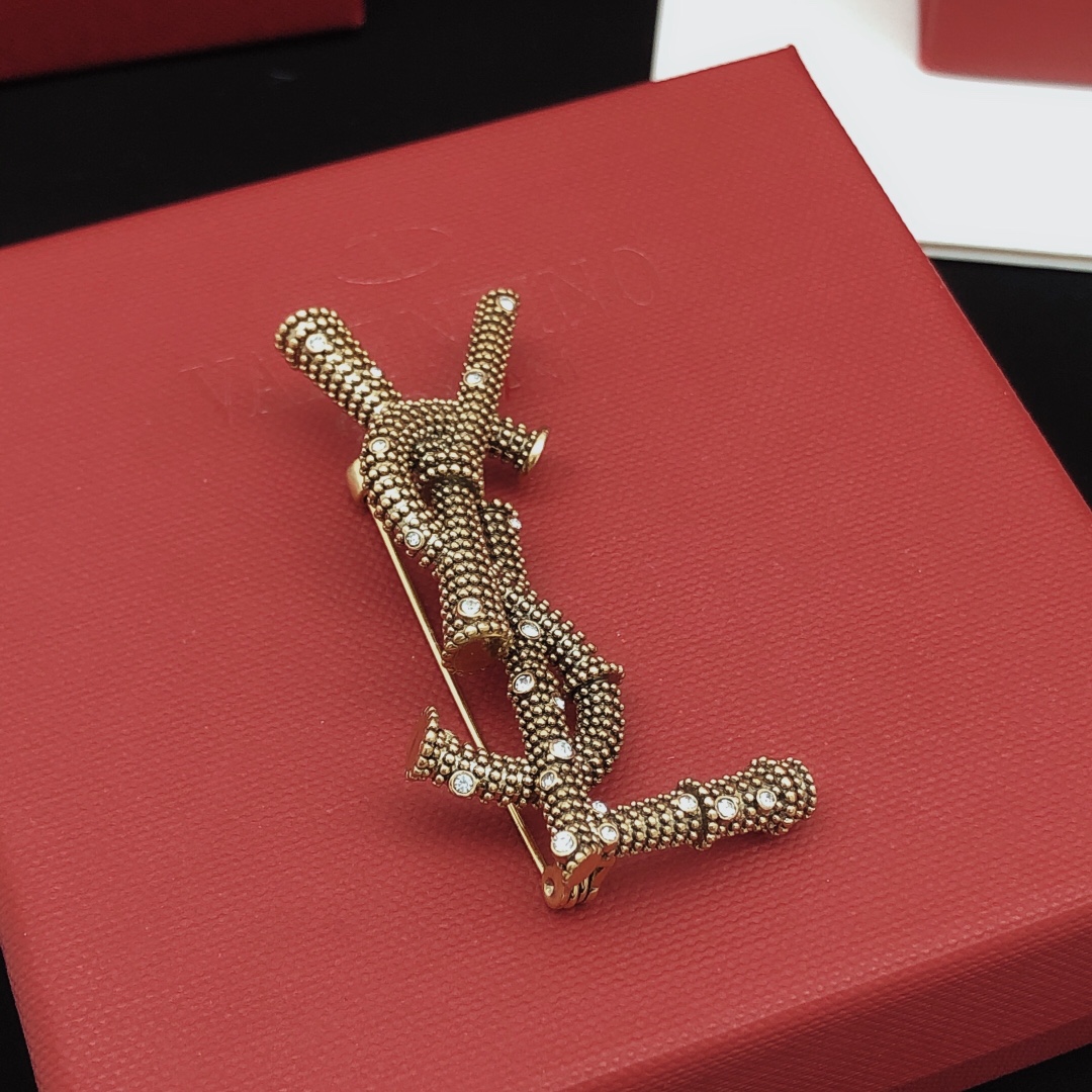 Saint Laurent Cassandre YSL Monogram Beaded Crystal Brooch brooch antique gold tone metal with clear crystal accents 4 5cm length