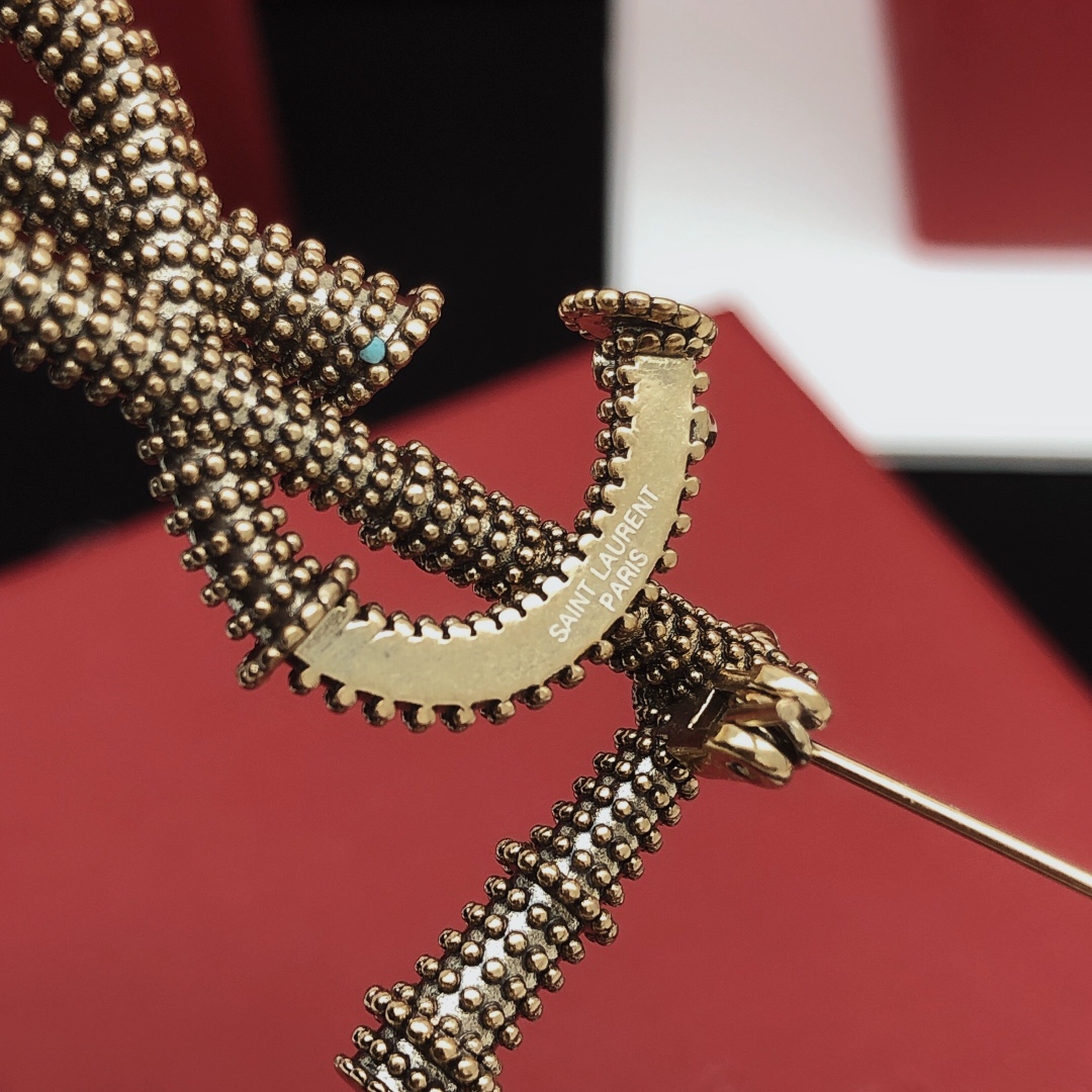 Saint Laurent Cassandre YSL Monogram Beaded Crystal Brooch brooch antique gold tone metal with clear crystal accents 4 5cm length