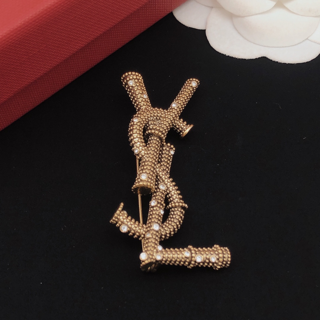 Saint Laurent Cassandre YSL Monogram Beaded Crystal Brooch brooch antique gold tone metal with clear crystal accents 4 5cm length