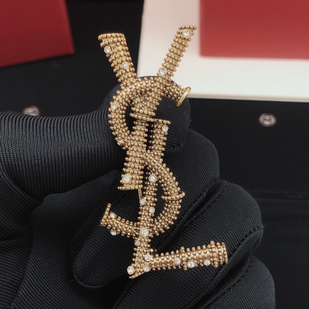 Saint Laurent Cassandre YSL Monogram Beaded Crystal Brooch brooch antique gold tone metal with clear crystal accents 4 5cm length