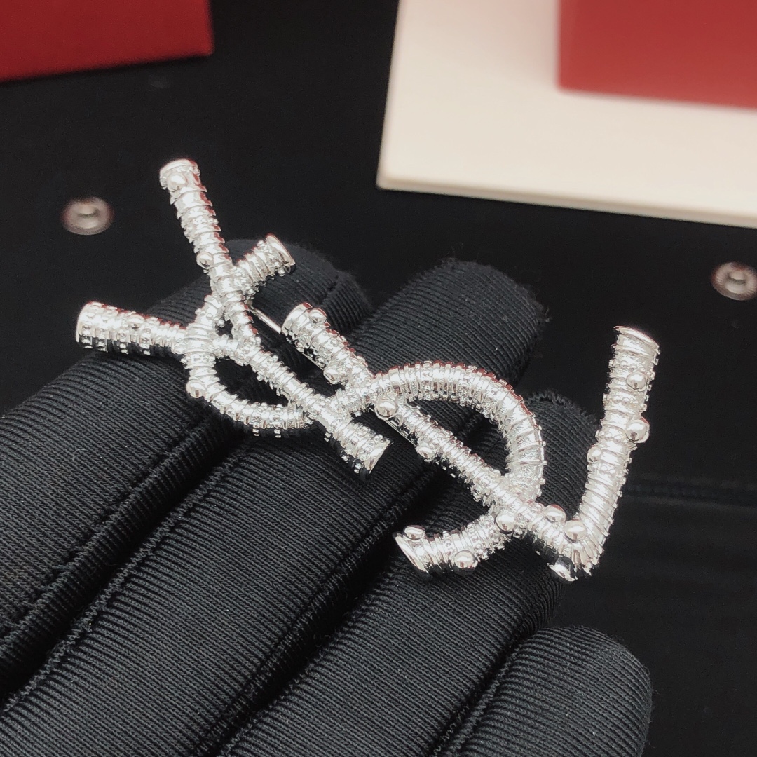 Saint Laurent YXZ0036 Cassandre Monogram Brooch brooch silver-toned metal with clear crystal accents 4 5cm