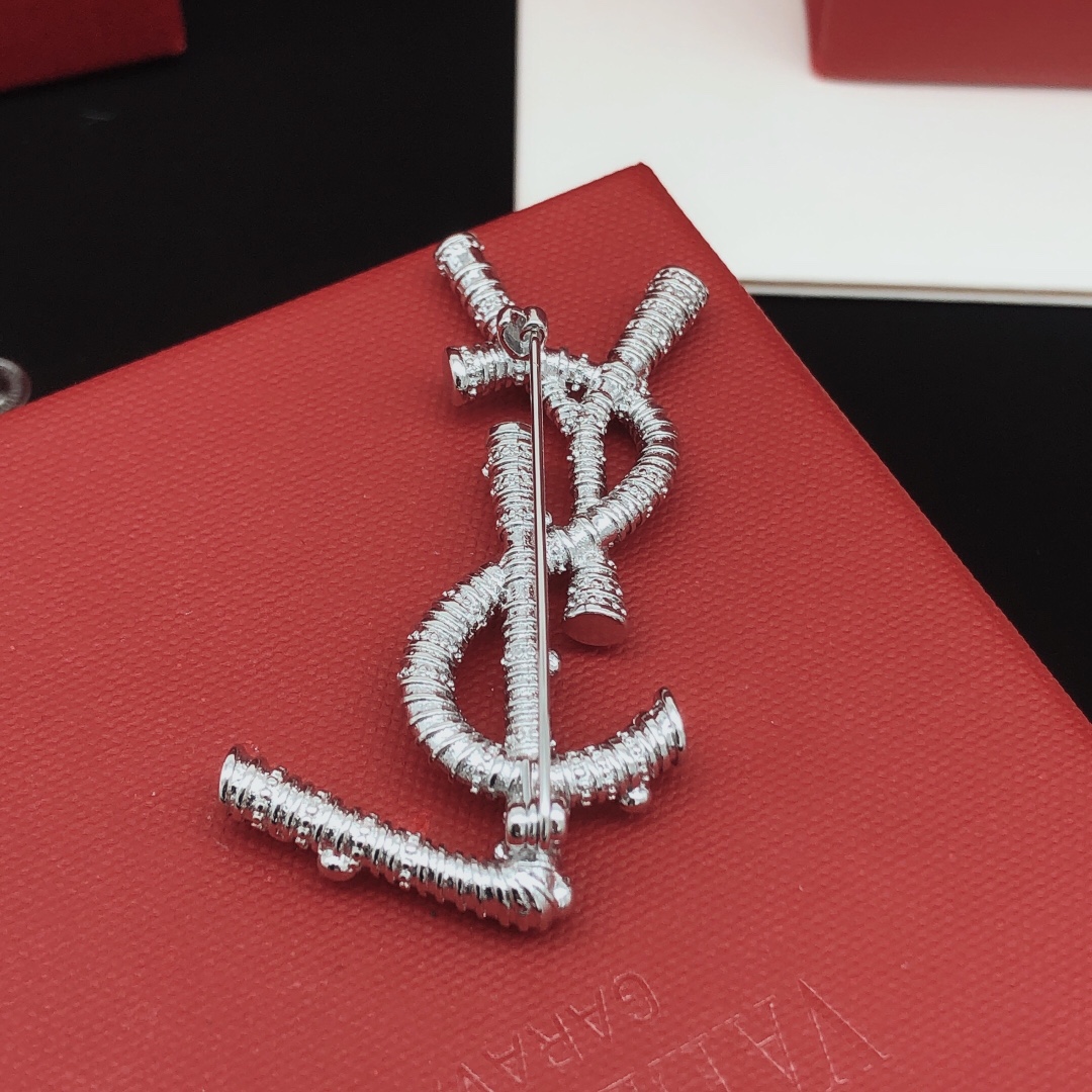 Saint Laurent YXZ0036 Cassandre Monogram Brooch brooch silver-toned metal with clear crystal accents 4 5cm