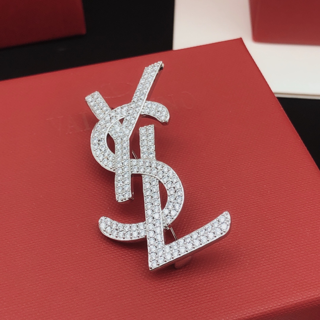 Saint Laurent YXZ0040 Cassandre Monogram brooch silver-toned metal with clear pave crystals 4 5cm width