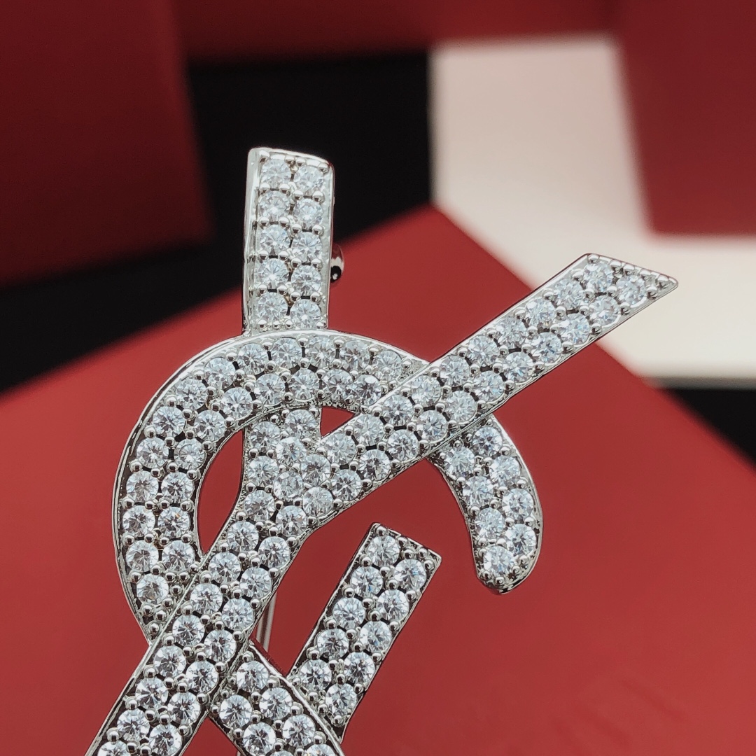Saint Laurent YXZ0040 Cassandre Monogram brooch silver-toned metal with clear pave crystals 4 5cm width
