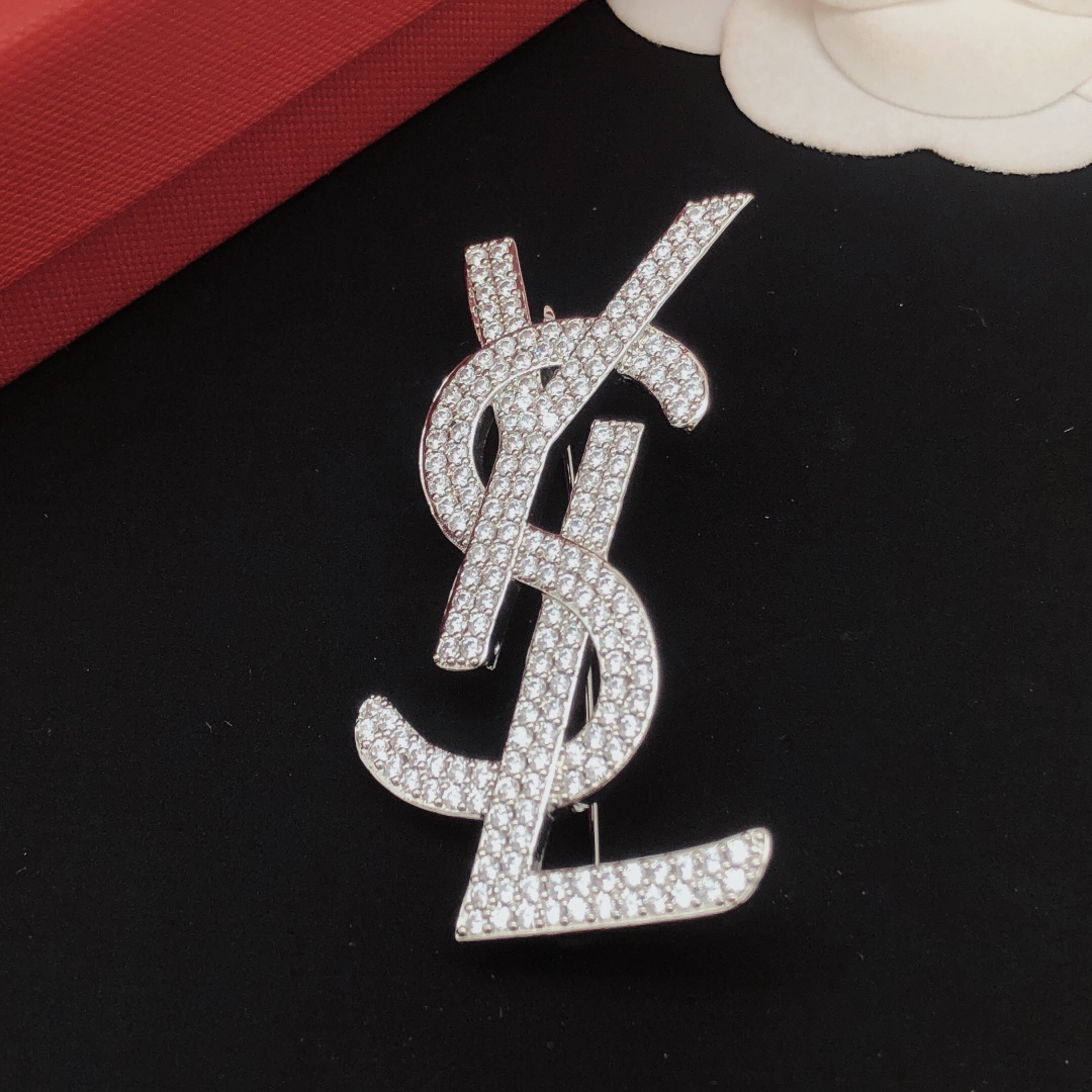 Saint Laurent YXZ0040 Cassandre Monogram brooch silver-toned metal with clear pave crystals 4 5cm width
