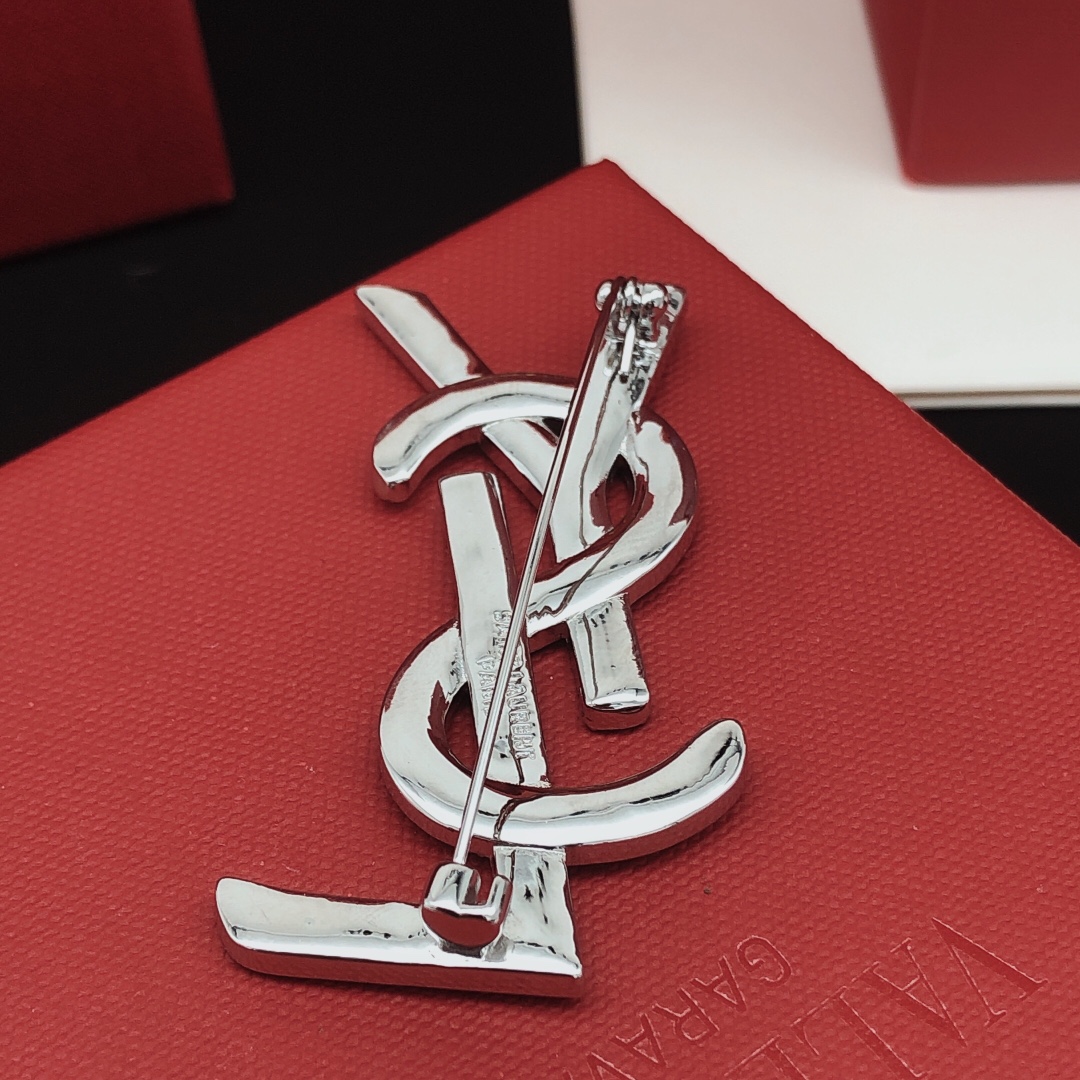 Saint Laurent YXZ0040 Cassandre Monogram brooch silver-toned metal with clear pave crystals 4 5cm width
