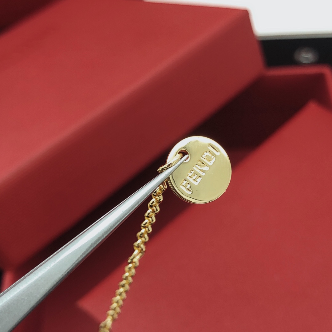 Fendi FF Logo Pendant Necklace necklace gold-tone metal with clear crystal accents 45cm with 5cm extender