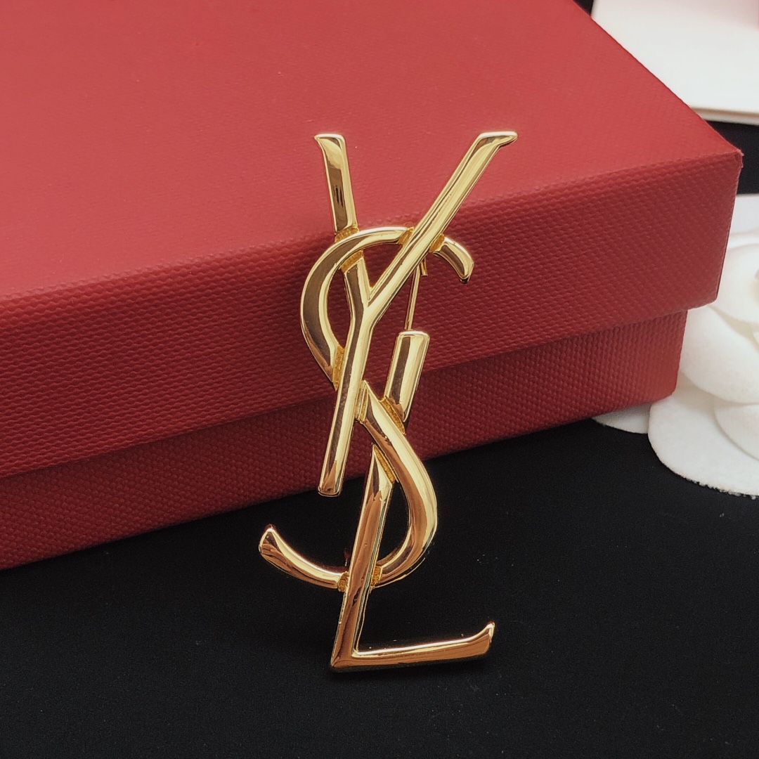 Saint Laurent Cassandre Monogram Brooch brooch gold tone metal no gemstones 4 5cm