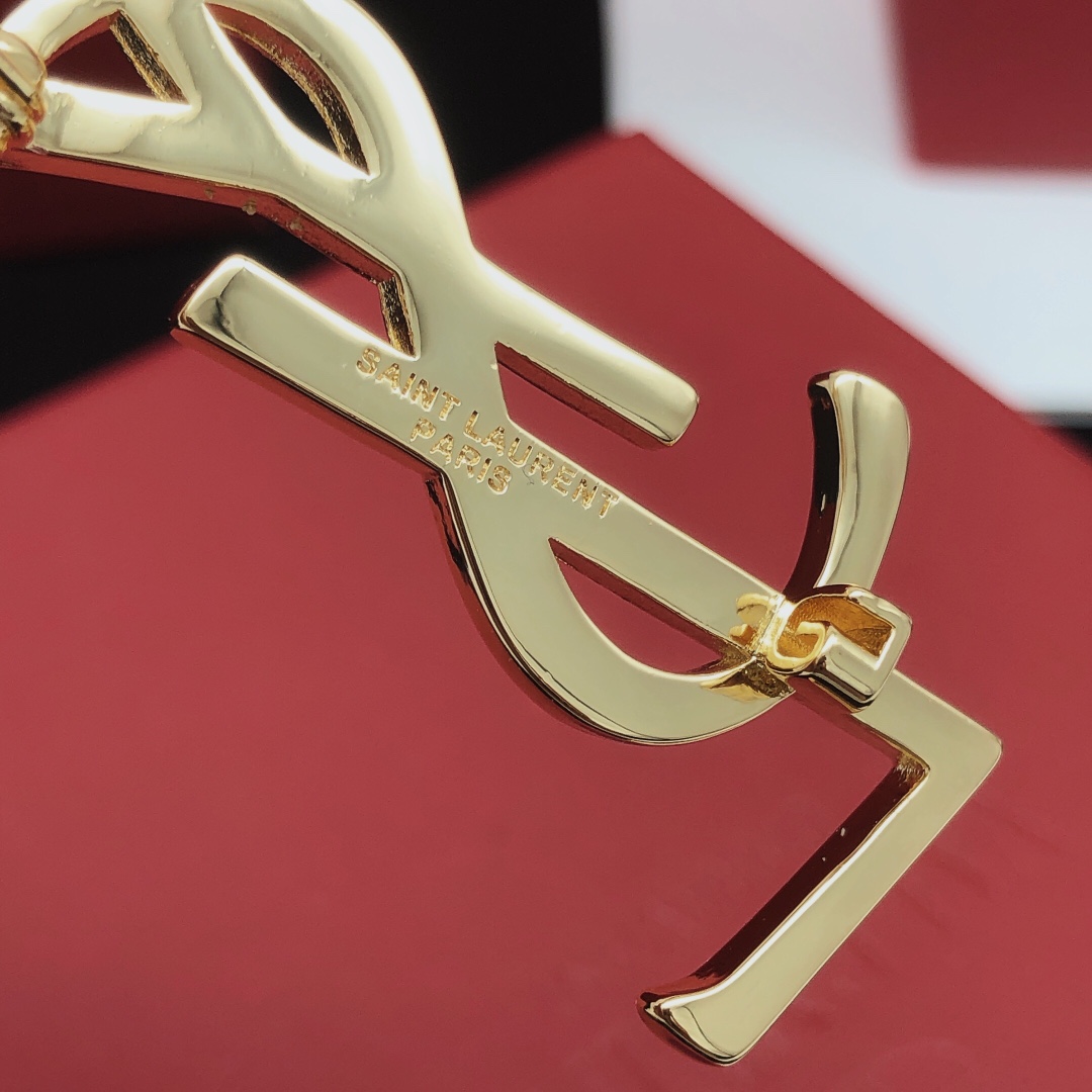 Saint Laurent Cassandre Monogram Brooch brooch gold tone metal no gemstones 4 5cm