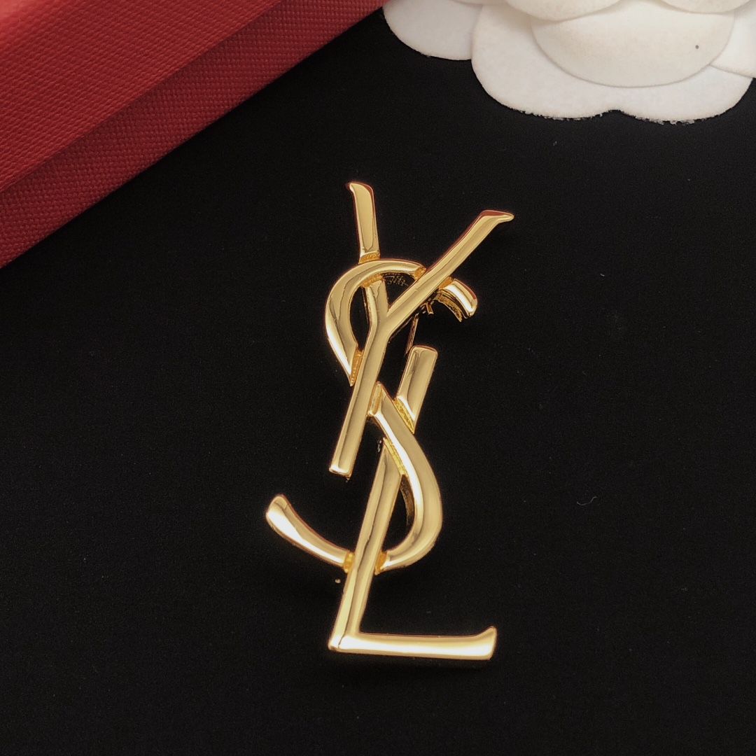 Saint Laurent Cassandre Monogram Brooch brooch gold tone metal no gemstones 4 5cm