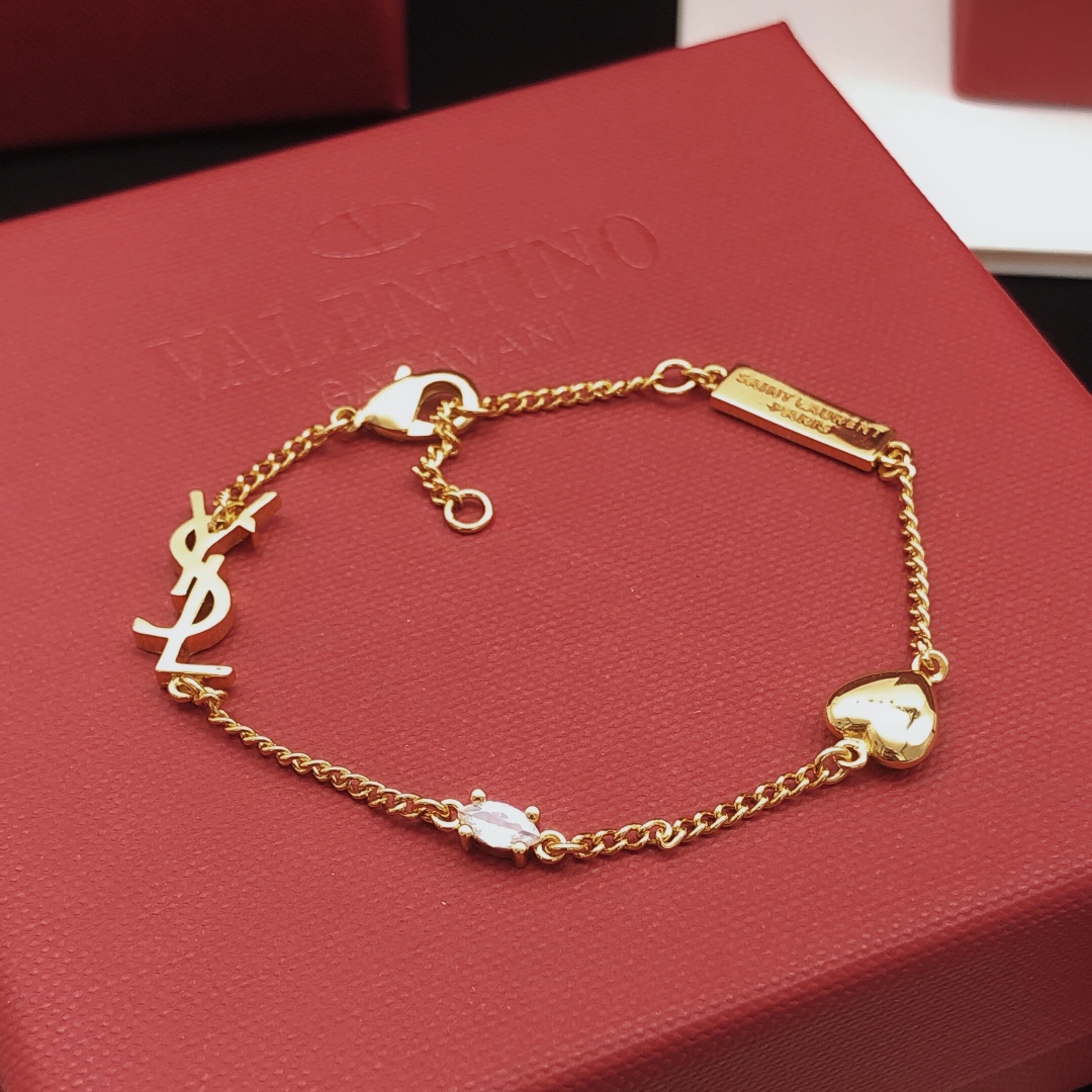 Saint Laurent YSL Monogram Heart Crystal Charm Bracelet bracelet gold-tone metal with clear faceted crystal 18cm with 2cm extender