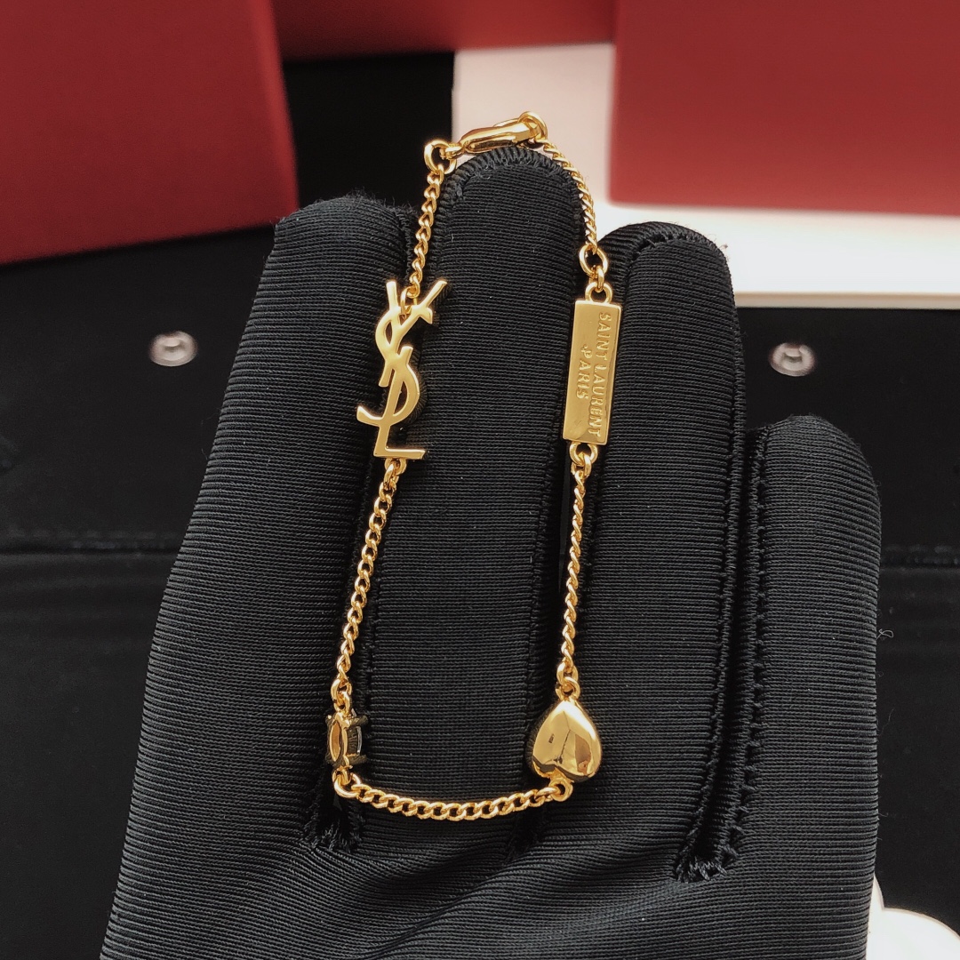 Saint Laurent YSL Monogram Heart Crystal Charm Bracelet bracelet gold-tone metal with clear faceted crystal 18cm with 2cm extender