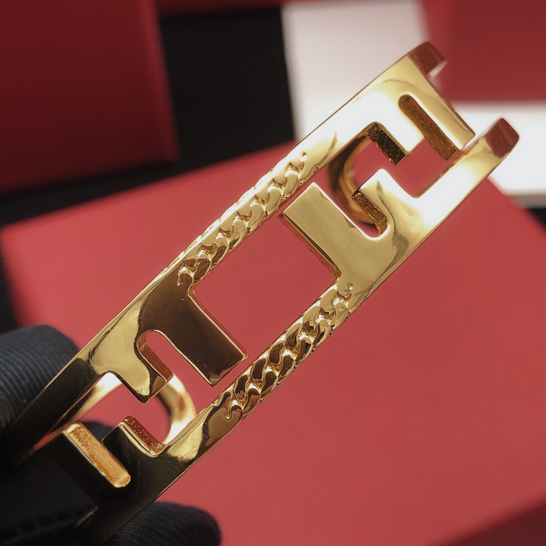 Fendi FF Logo Cutout Cuff bracelet Gold-tone metal no accent stones One Size open cuff standard 6 5 inch inner circumference
