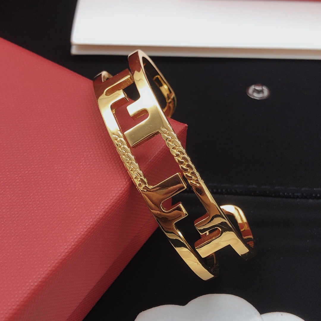 Fendi FF Logo Cutout Cuff bracelet Gold-tone metal no accent stones One Size open cuff standard 6 5 inch inner circumference