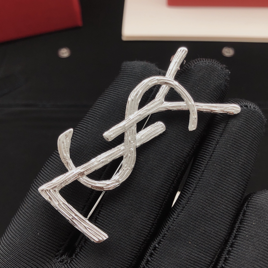Saint Laurent Cassandre Monogram Brooch brooch silver-toned metal no gemstones 4 5cm height