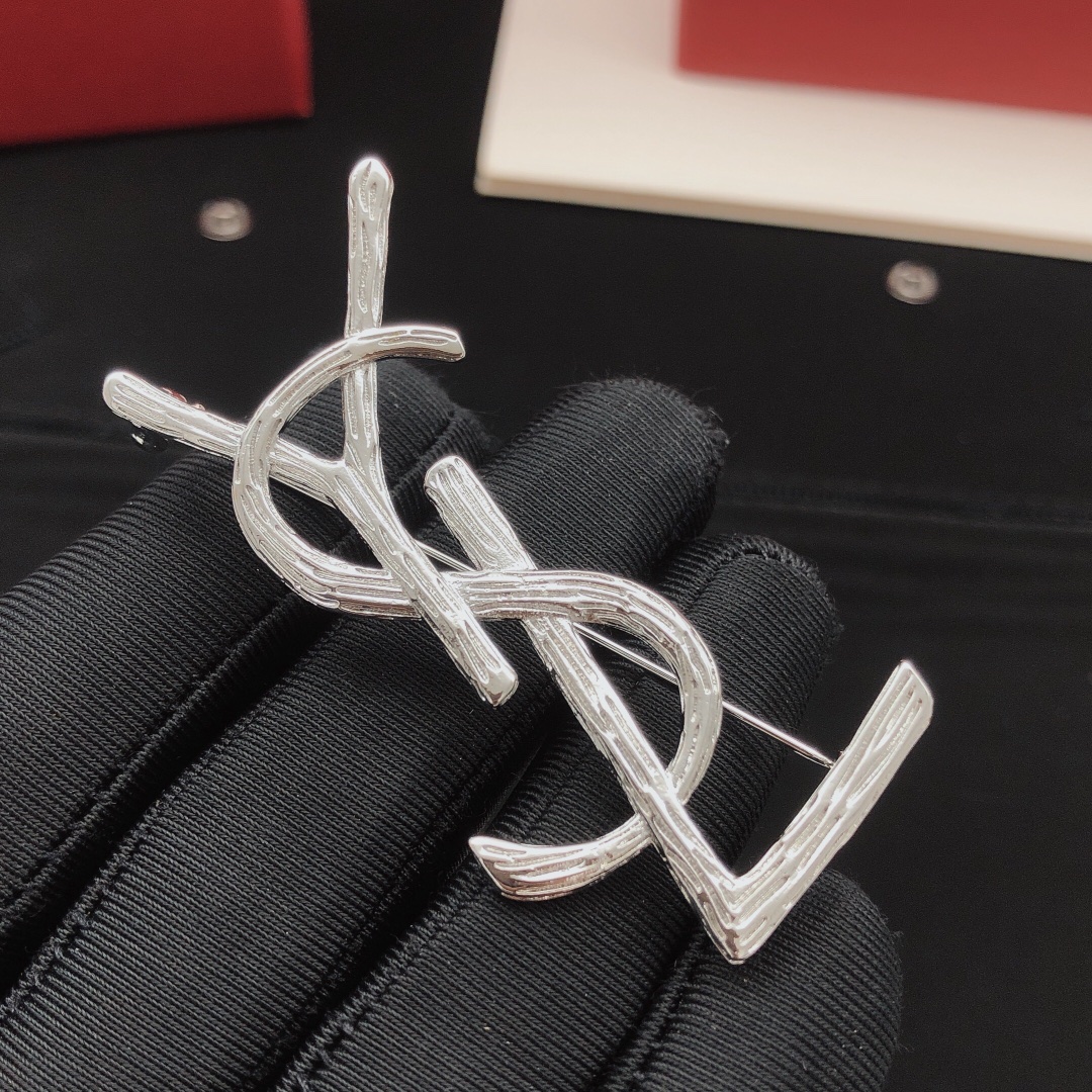 Saint Laurent Cassandre Monogram Brooch brooch silver-toned metal no gemstones 4 5cm height