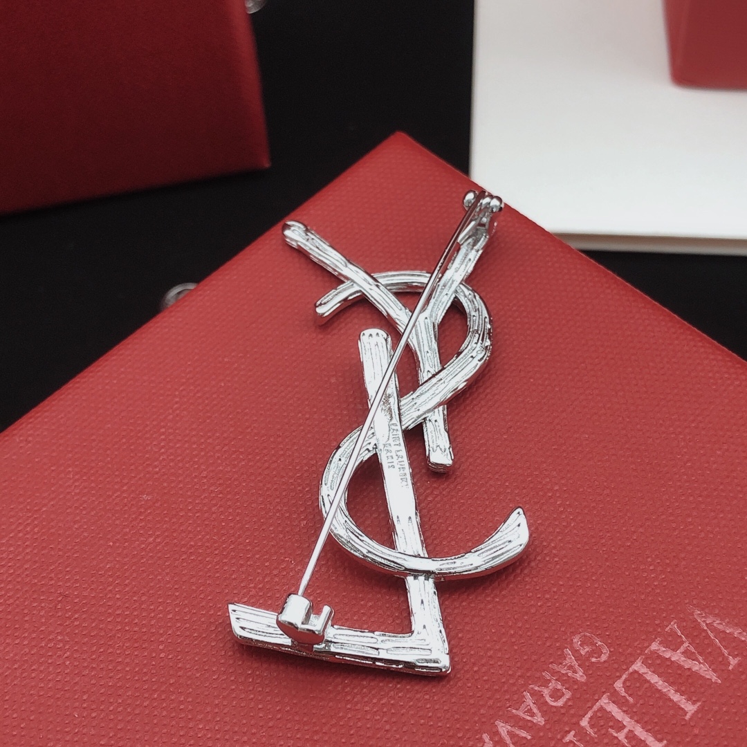 Saint Laurent Cassandre Monogram Brooch brooch silver-toned metal no gemstones 4 5cm height