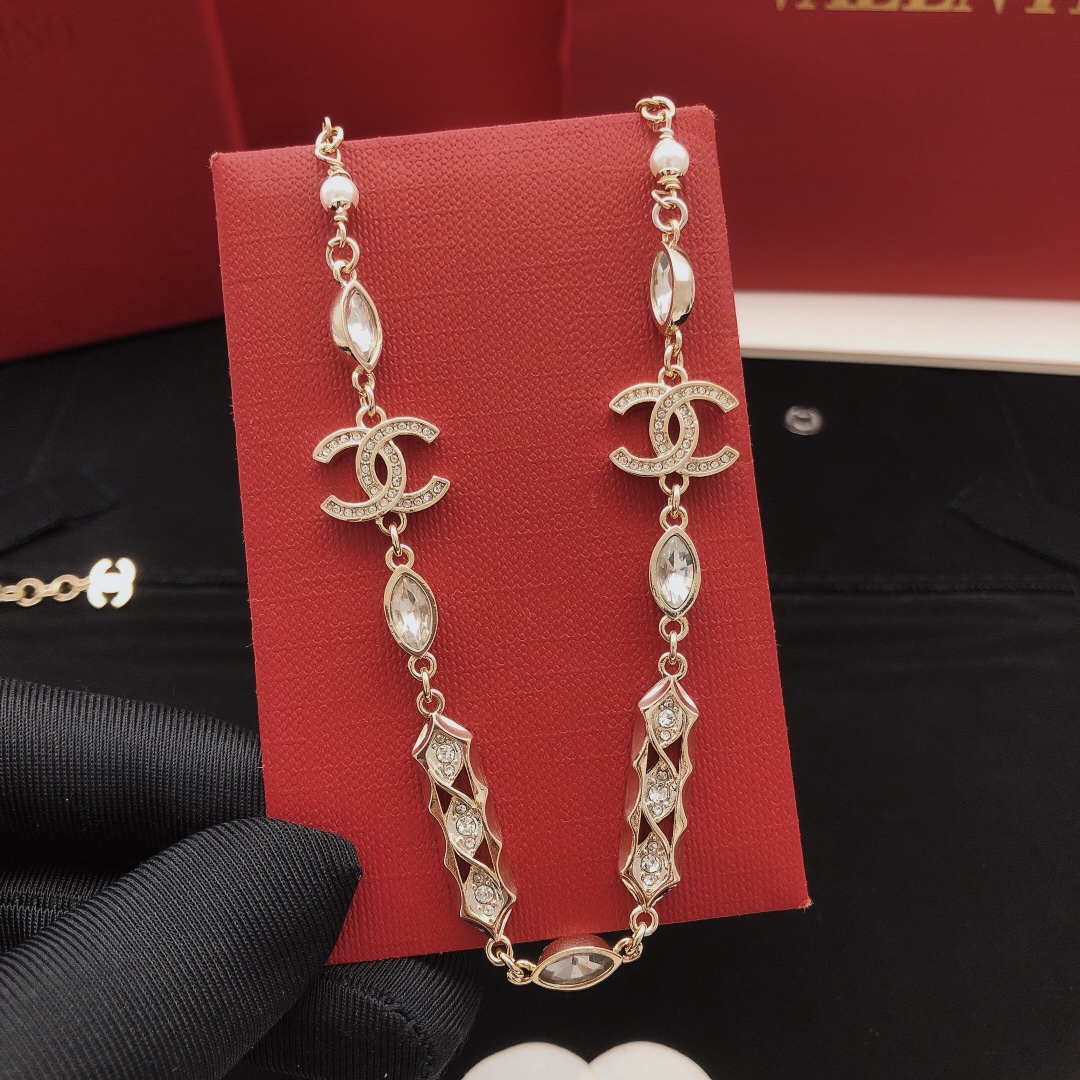 Chanel CC Logo Pearl Crystal Choker necklace gold-tone metal white faux pearl clear crystal 40cm with 5cm extender