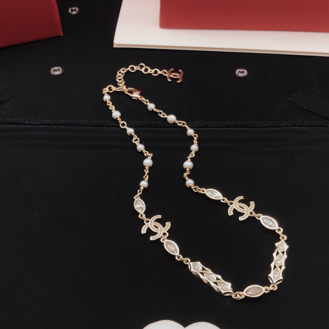 Chanel CC Logo Pearl Crystal Choker necklace gold-tone metal white faux pearl clear crystal 40cm with 5cm extender