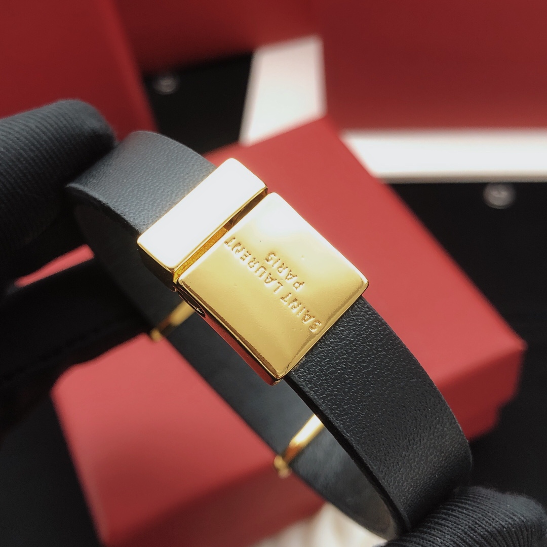 Saint Laurent YSL Monogram Leather Bracelet bracelet Black leather with gold-tone metal hardware 19cm