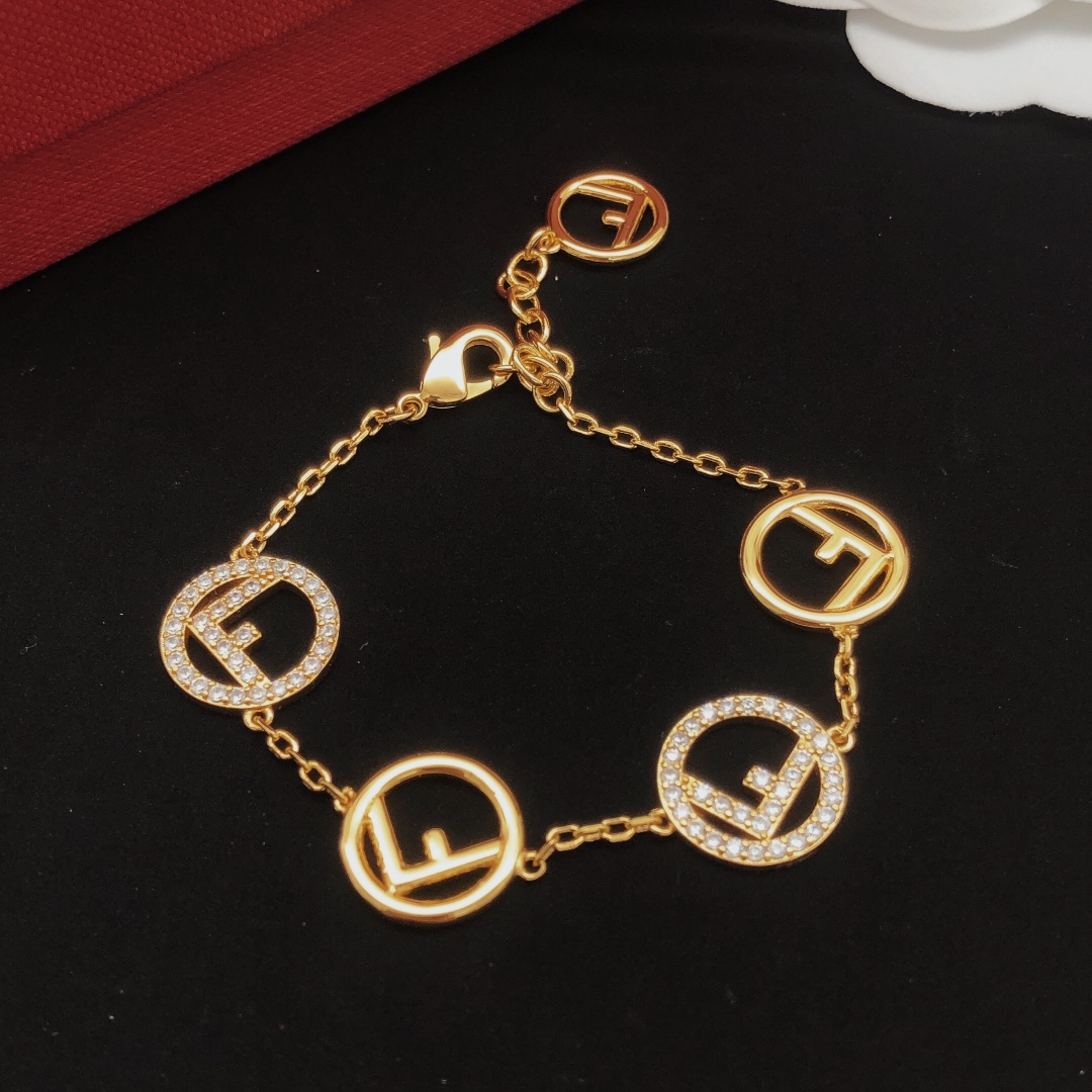 Fendi F is Fendi bracelet gold-tone metal with clear crystal accents 18cm with 3cm extender