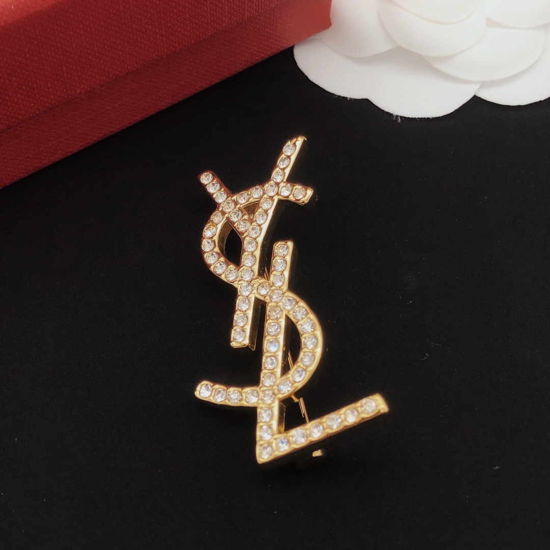 Saint Laurent Cassandre YSL Monogram Brooch brooch gold-tone metal with clear crystal rhinestones 4 5cm length