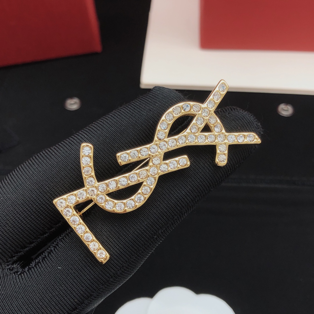 Saint Laurent Cassandre YSL Monogram Brooch brooch gold-tone metal with clear crystal rhinestones 4 5cm length