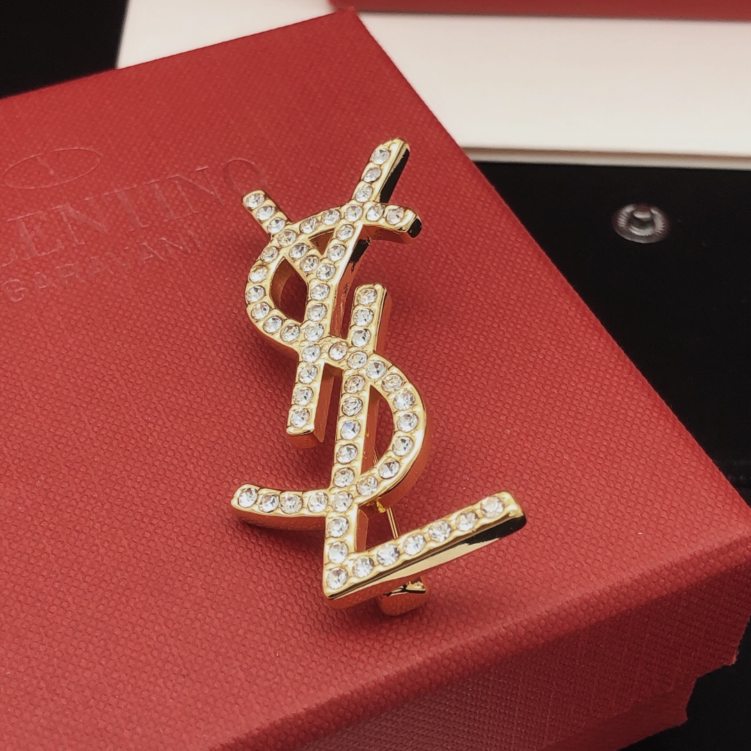 Saint Laurent Cassandre YSL Monogram Brooch brooch gold-tone metal with clear crystal rhinestones 4 5cm length