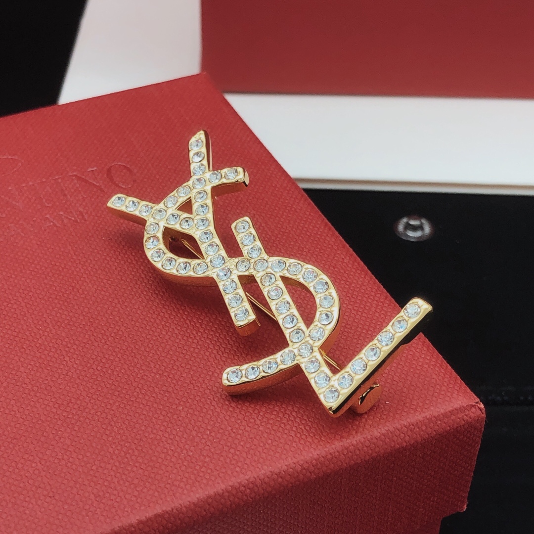 Saint Laurent Cassandre YSL Monogram Brooch brooch gold-tone metal with clear crystal rhinestones 4 5cm length