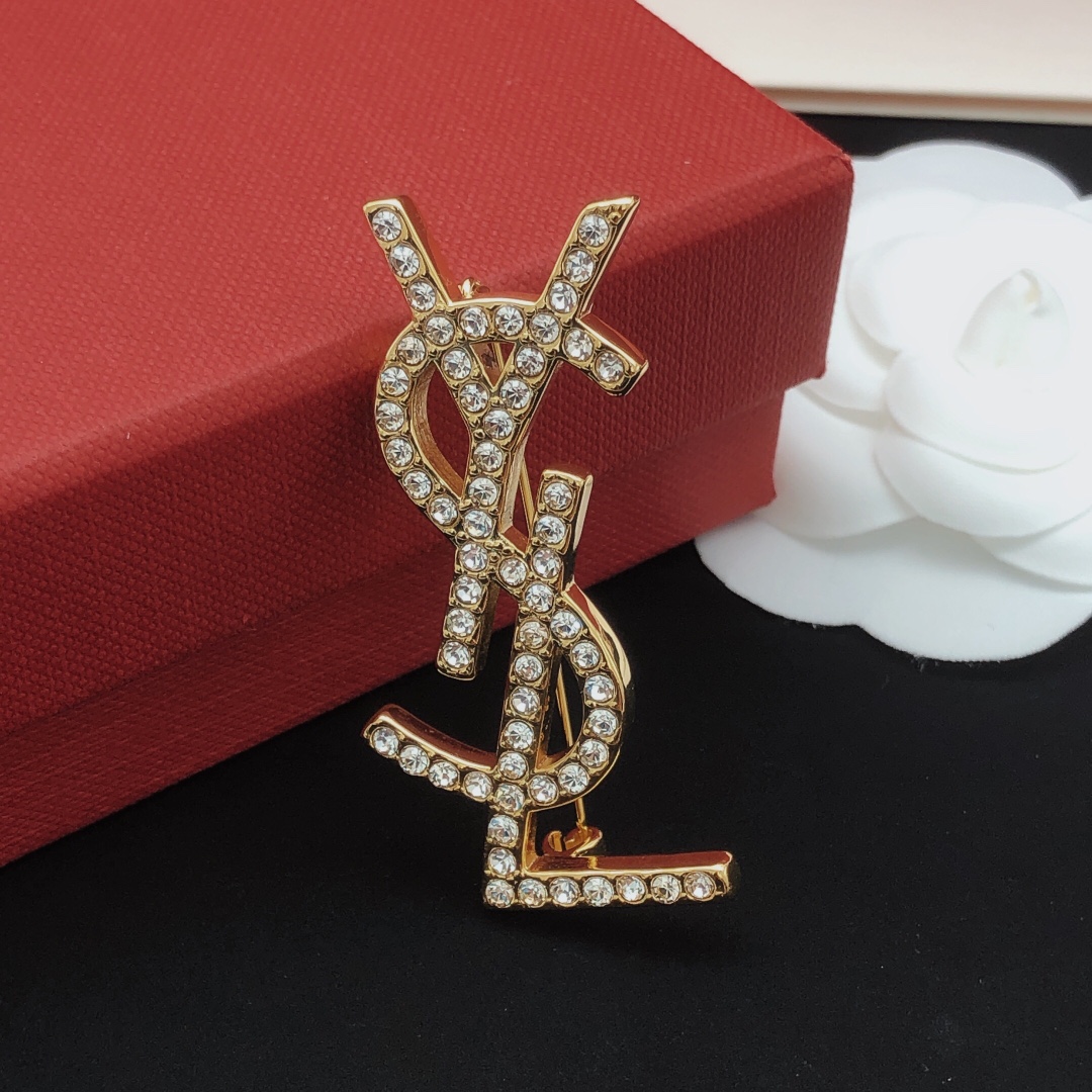 Saint Laurent Cassandre YSL Monogram Brooch brooch gold-tone metal with clear crystal rhinestones 4 5cm length