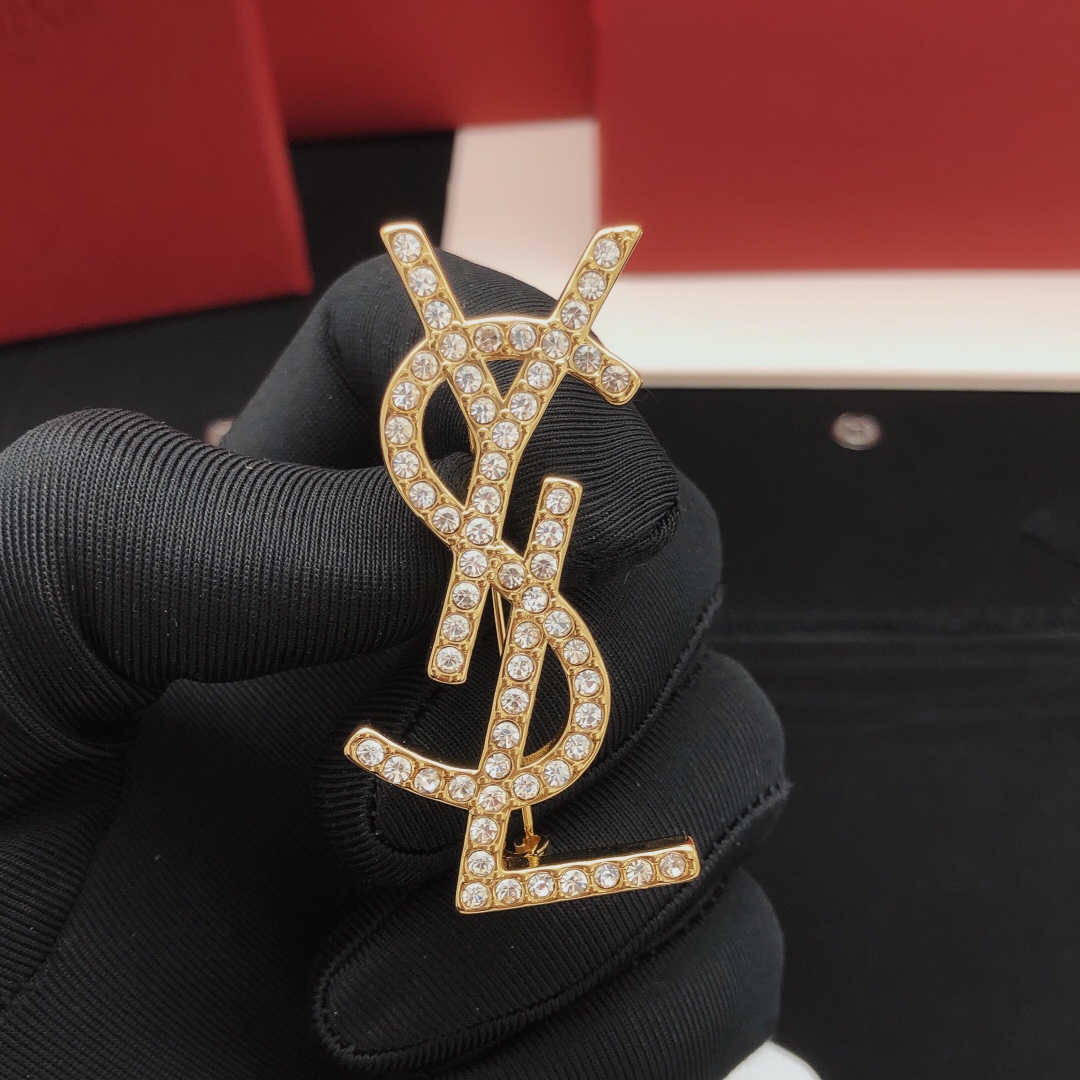 Saint Laurent Cassandre YSL Monogram Brooch brooch gold-tone metal with clear crystal rhinestones 4 5cm length