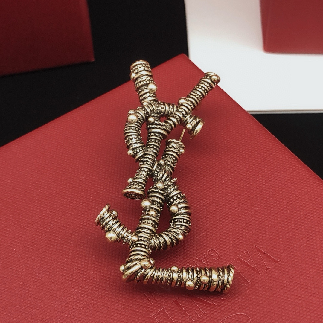 Saint Laurent YXZ0013 Cassandre Textured Monogram Brooch brooch antique gold tone metal no accent stones 4 5cm length