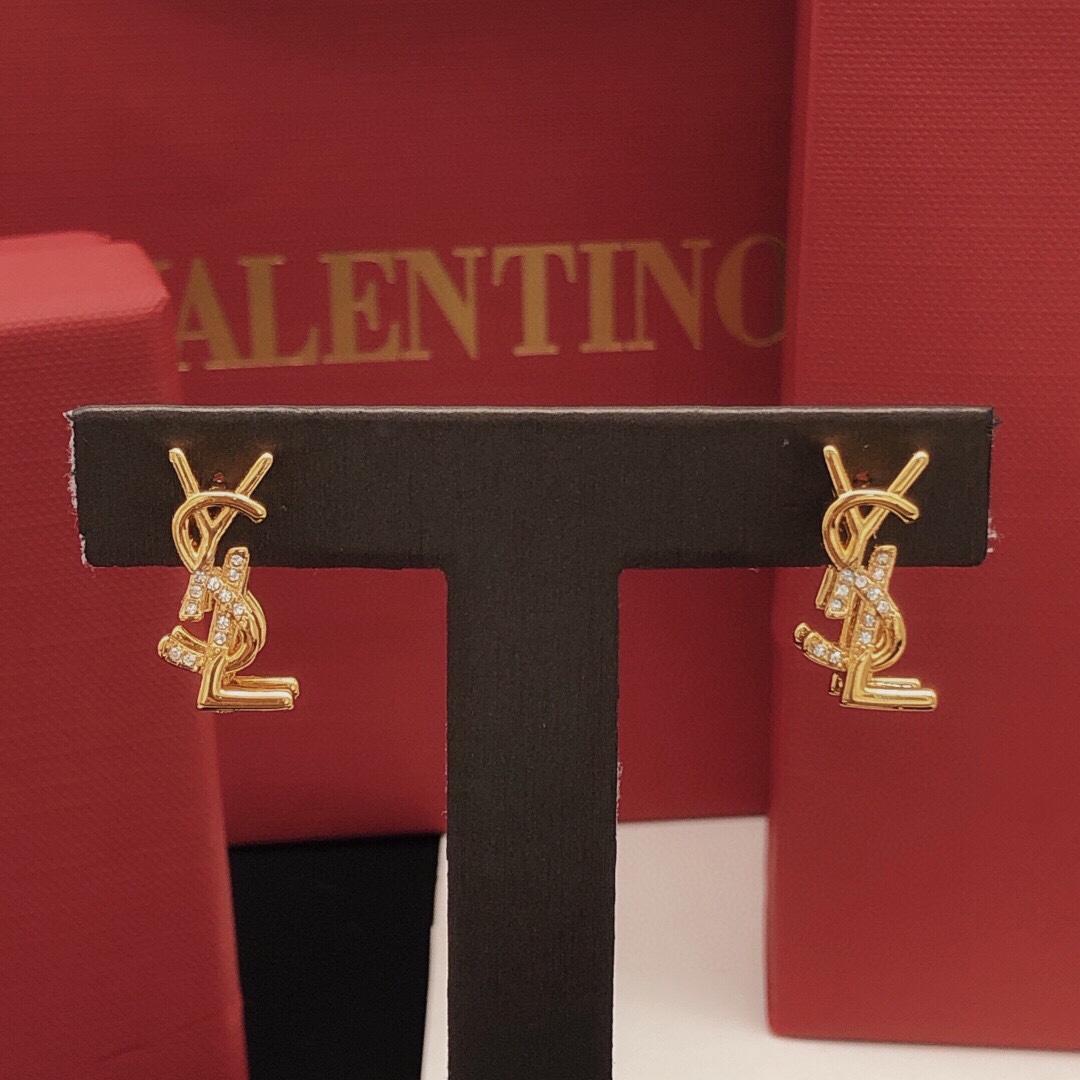 Saint Laurent YED0070 Cassandre Monogram earrings gold-tone metal with clear crystal accents 1 5cm stud length