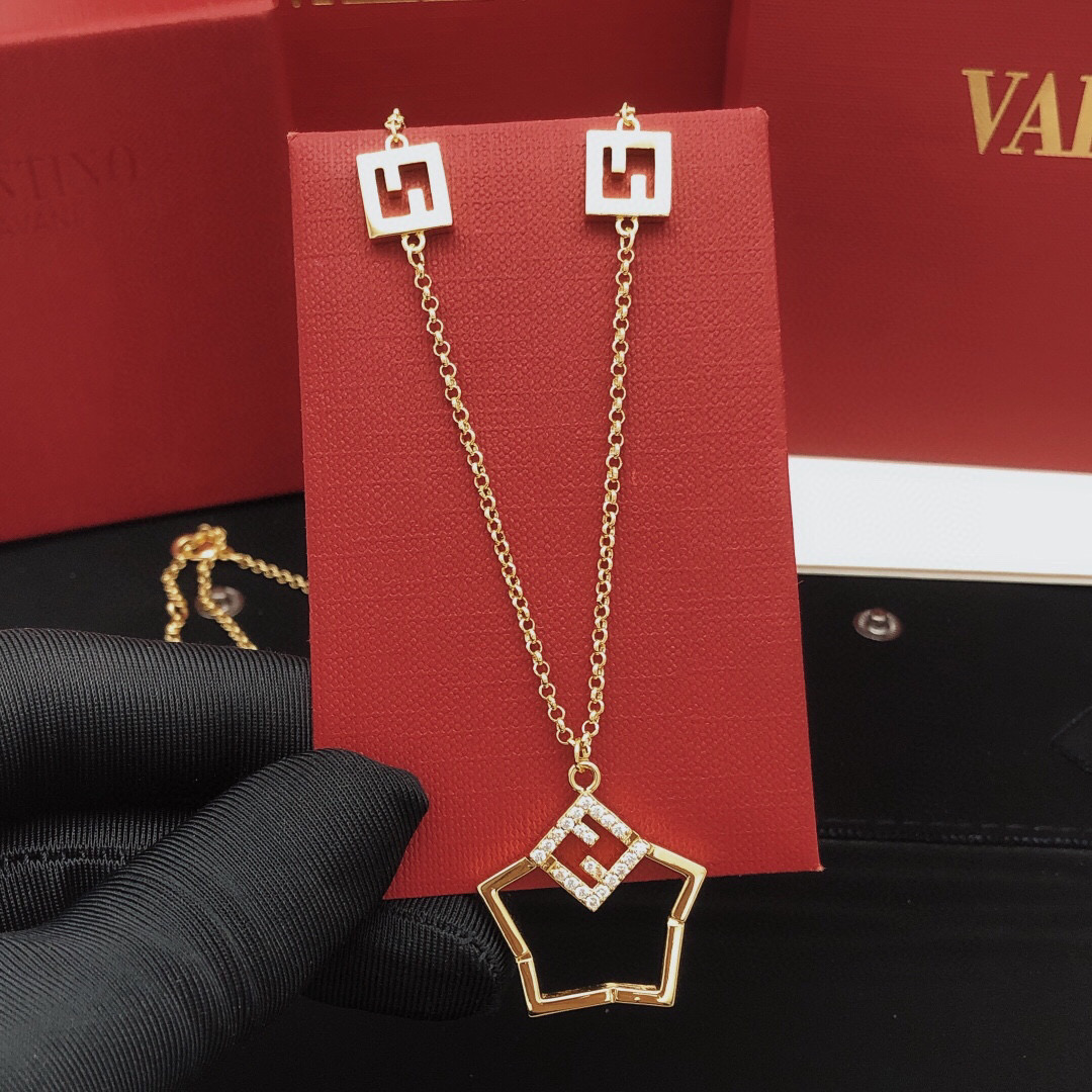 Fendi FF Logo Shield Pendant necklace gold-tone metal with clear crystal accents 45cm with 5cm extender