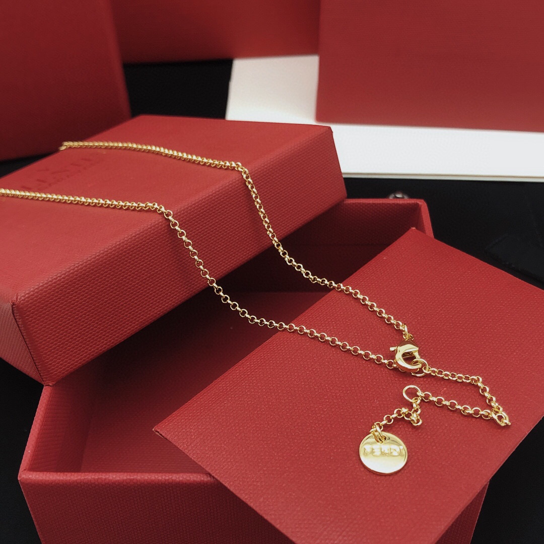 Fendi FF Logo Shield Pendant necklace gold-tone metal with clear crystal accents 45cm with 5cm extender