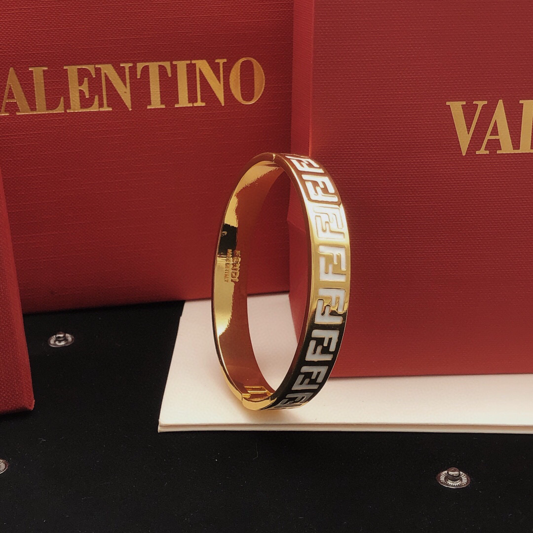 Fendi FF Logo Enamel Bangle bracelet gold-tone metal with white enamel 17cm inner circumference